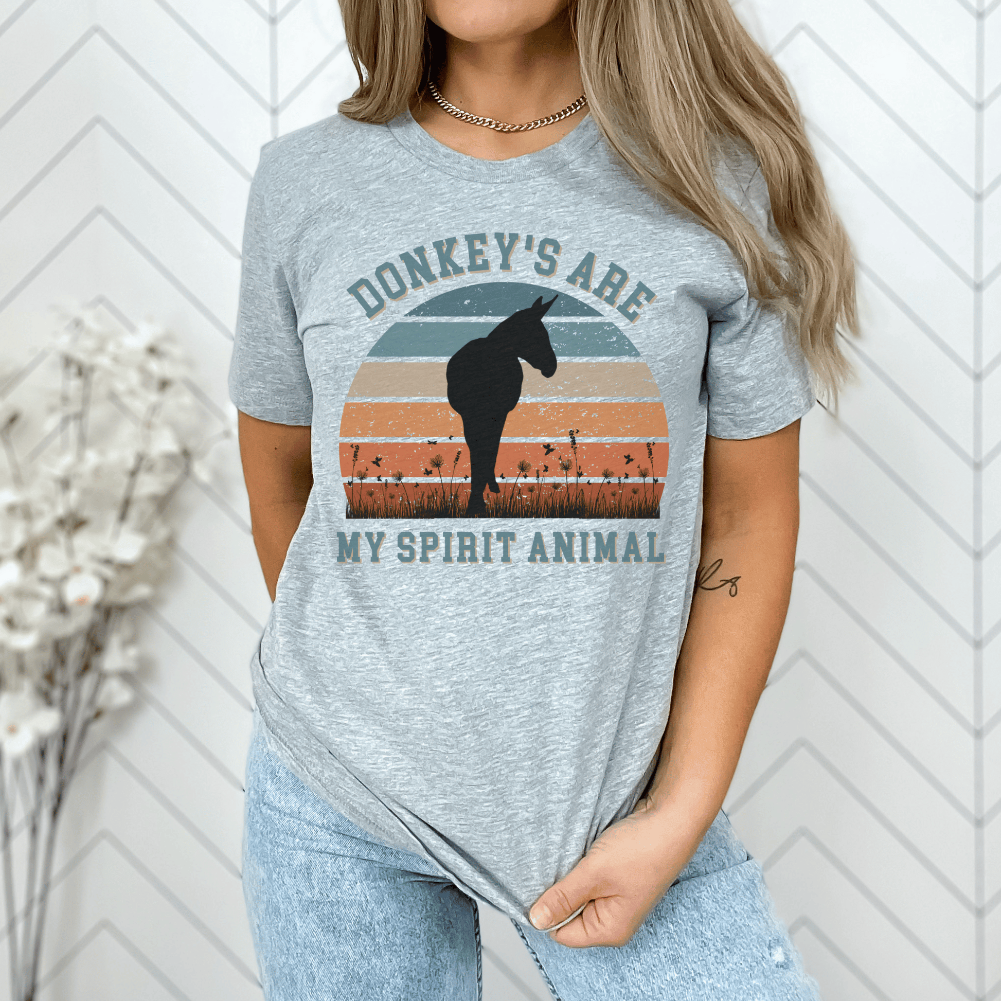 This unique piece features a charming donkey illustration on the front, perfectly capturing the spirit and beauty of these lovable creatures. The saying Donkeys are my spirit animal adds a touch of whimsy and showcases your love for these incredible animals.