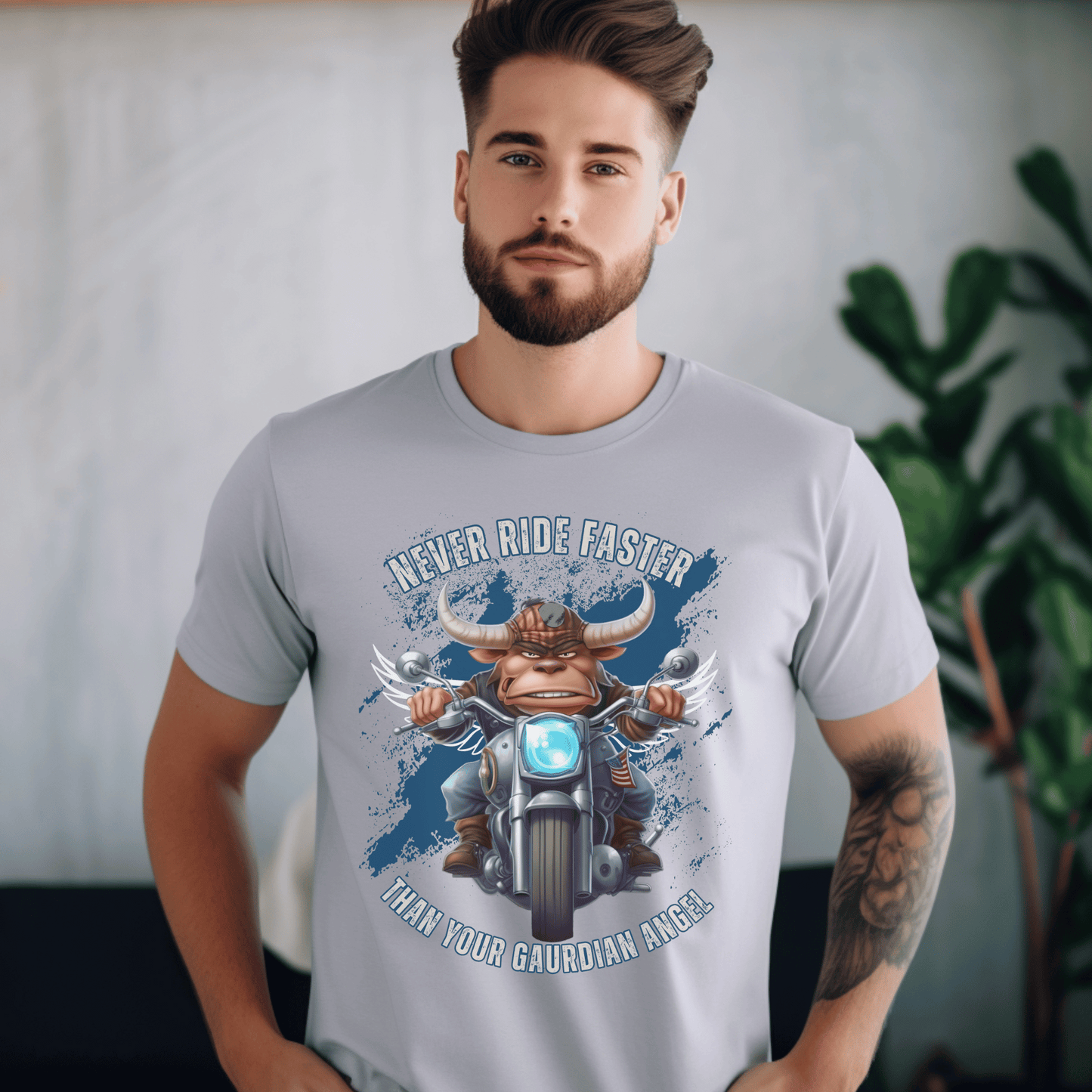 Biker t-shirt with a bull with angel wings riding a motorcyle ,with the saying Never Ride Faster Than Your Gaurdian Angel on a t-shirt.