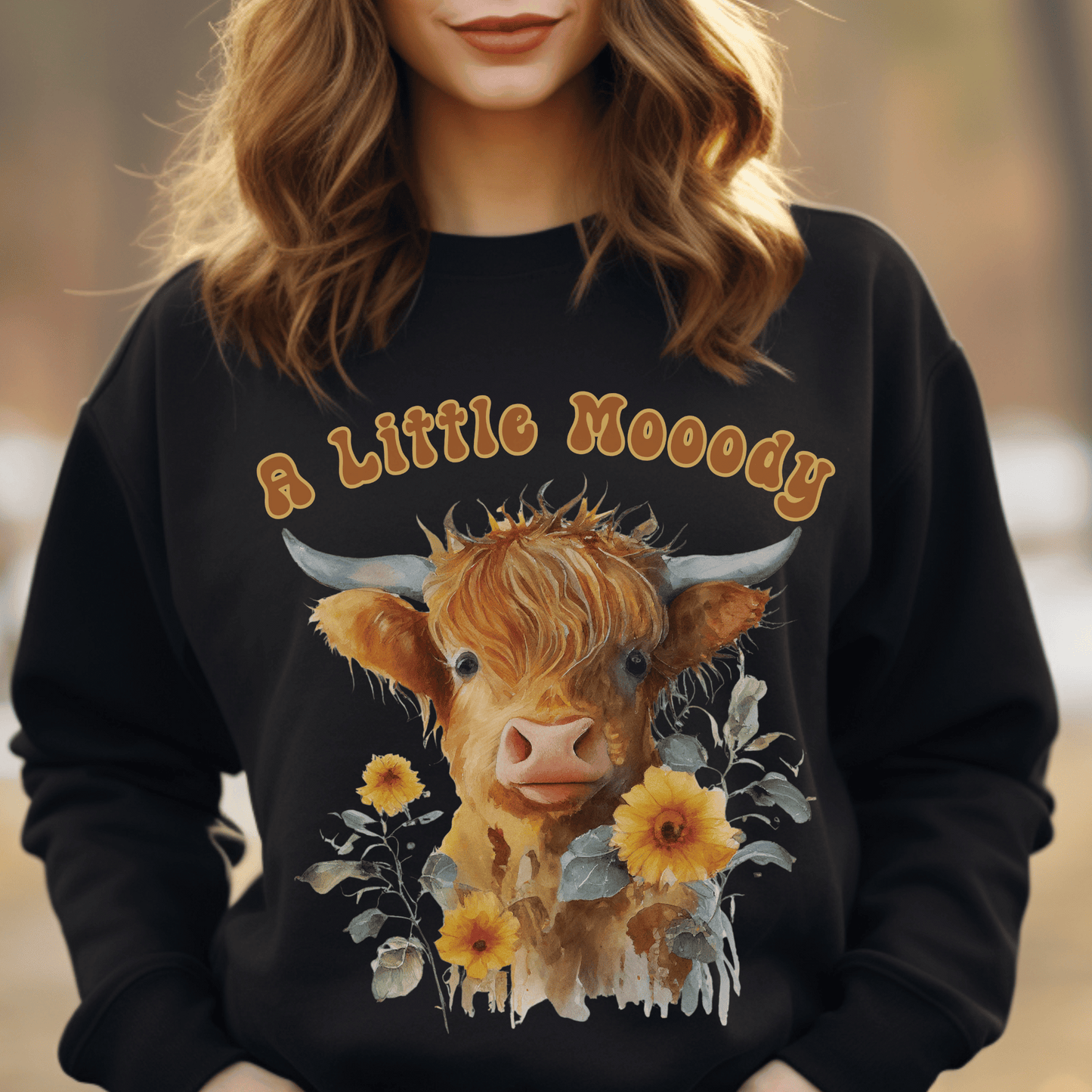  sweatshirt featuring a little moody saying, perfectly complemented by an adorable Highland cow calf and a radiant arrangement of sunflowers. 