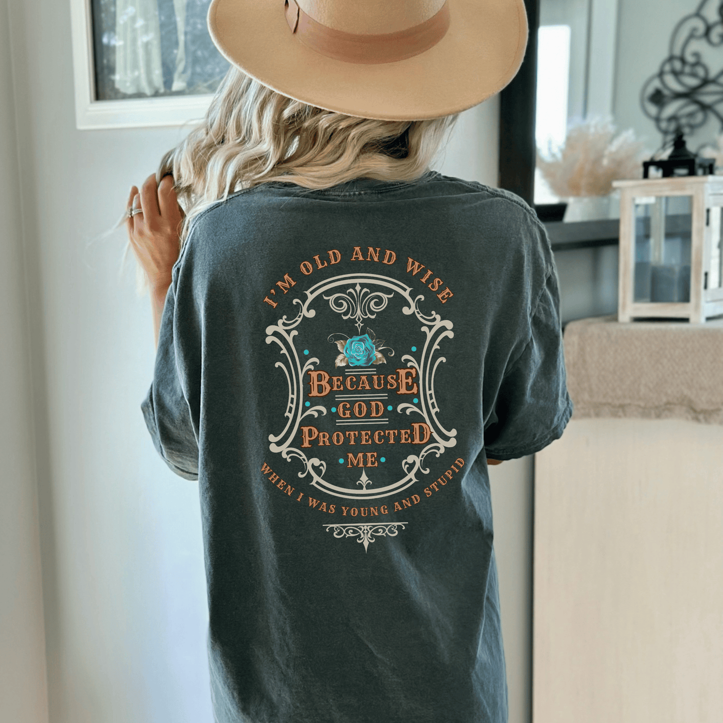 Funny t-shirt that perfectly captures the wisdom that comes with age and the protection of God! This witty shirt features the humorous phrase old and wise because God protected me when I was young and stupid.