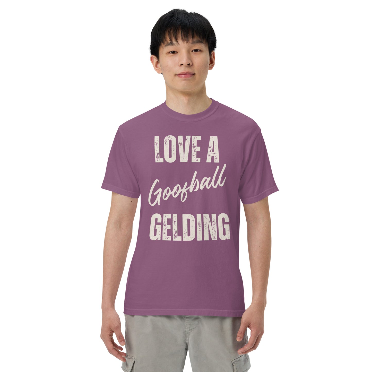 Graphic tee with the saying love a goofball gelding printed on a comfort colors tee.