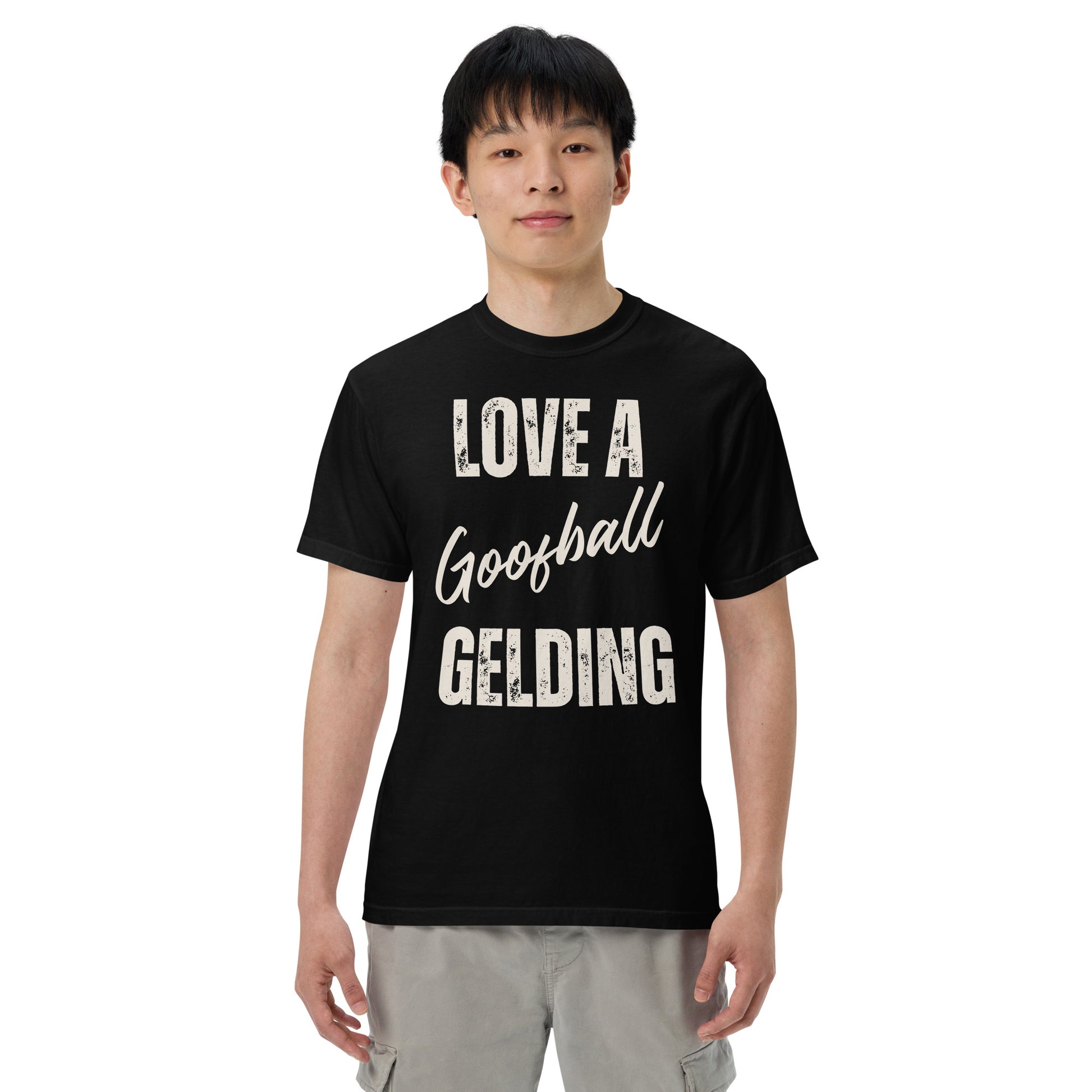 Graphic tee with the saying love a goofball gelding printed on a comfort colors tee.