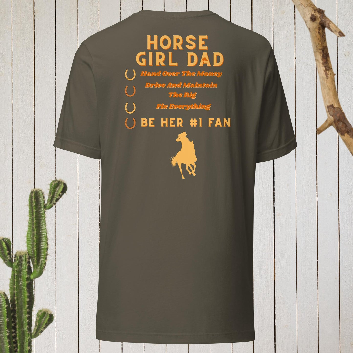 This t-shirt features the word "Dad" on the front and "Horse Girl Dad" on the back, along with the phrase "Hand Over the Money, Drive and Maintain the Rig, Fix Everything, and Be Her #1 Fan." It's a fun and playful way to show your love and support for your daughter's passion for horses.