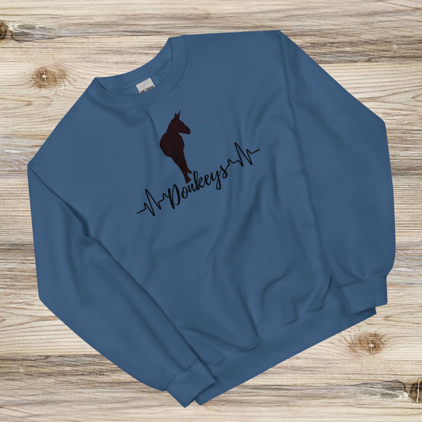 a heartbeat design with a silhouette of a donkey on a indigo crew neck sweatshirt