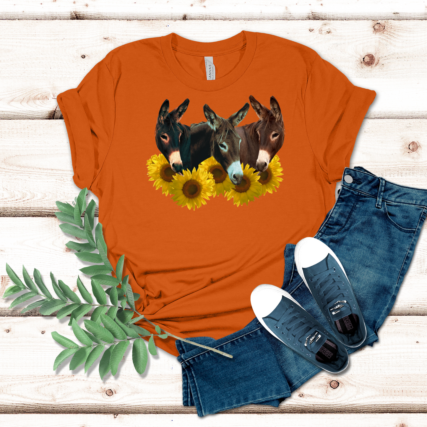 Three Donkey Heads surrounded by sunflowers on a crew neck t-shirt