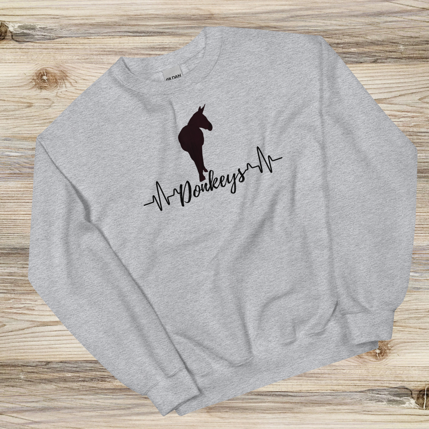 a heartbeat design with a silhouette of a donkey on a sport grey crew neck sweatshirt