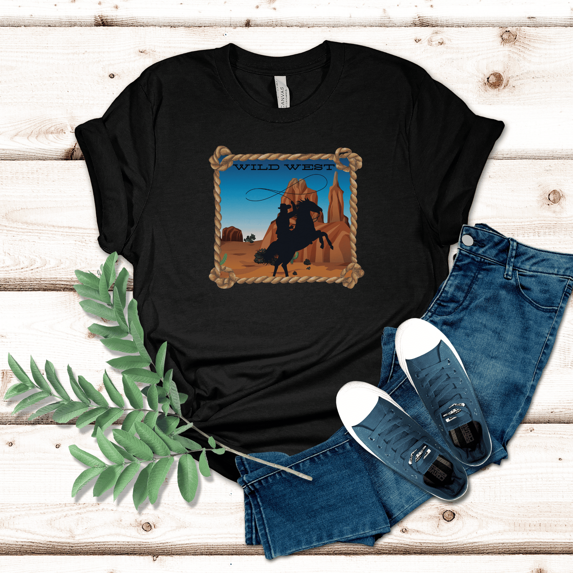 Black heather colored tee with a wild west desert scene  with a rearing horse and cowboy