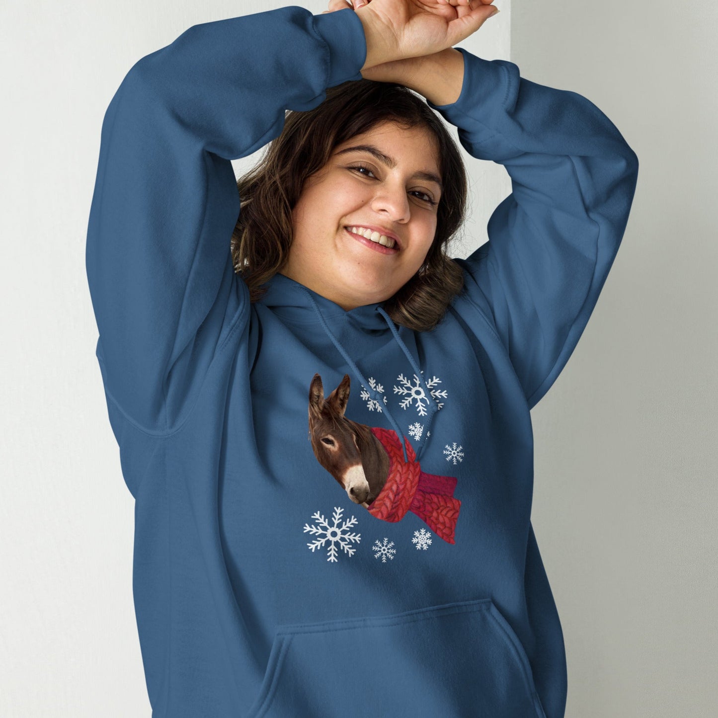 Winter Donkey with a scarf and snow flakes on a Indigo hoodie sweatshirt